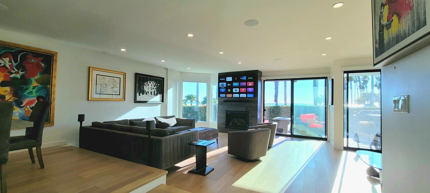 Lighting and TV in a wooden floor living room 